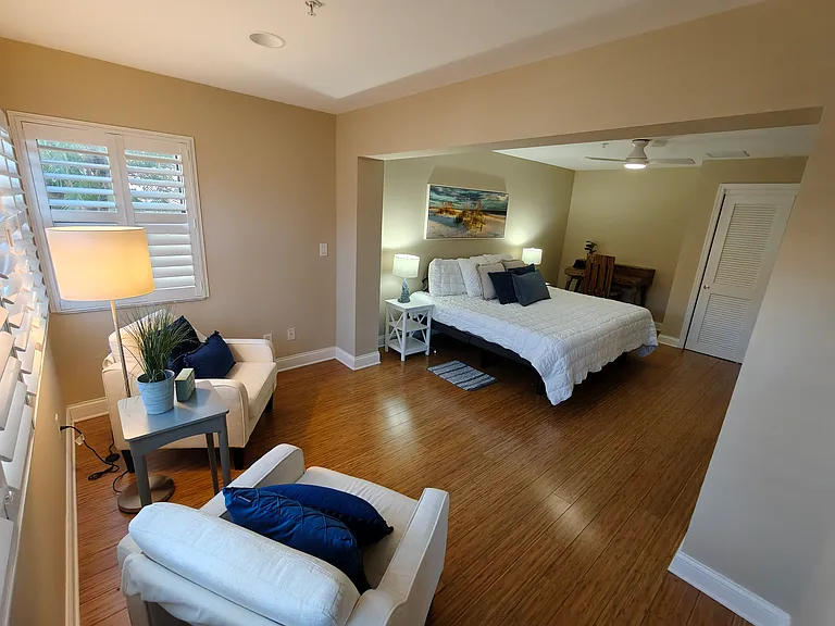 Guest bed room w/ access door to lanai #1. 2 separate twin XL beds (electric adjustable).