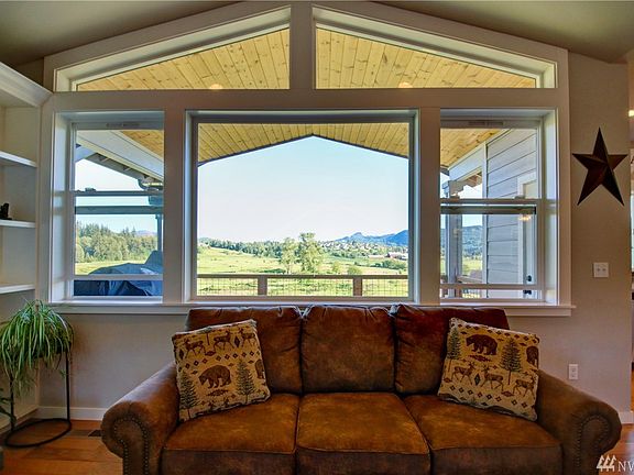 Entry opens to open concept living space with welcoming views.