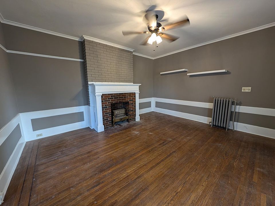 Living Room with Decorative Fireplace