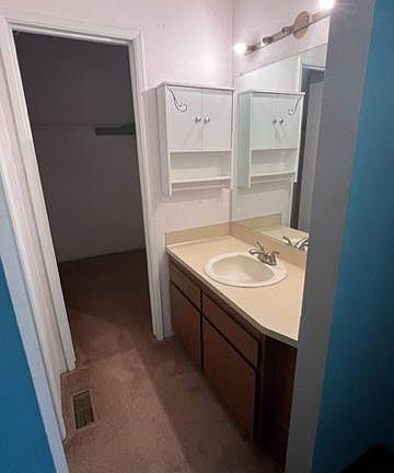 Master vanity and walk-in closet.