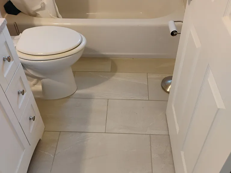 Updated bathroom including flooring