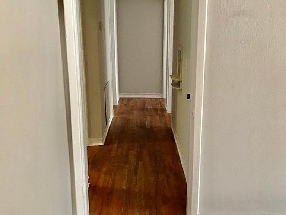 Hall to bedrooms and bath