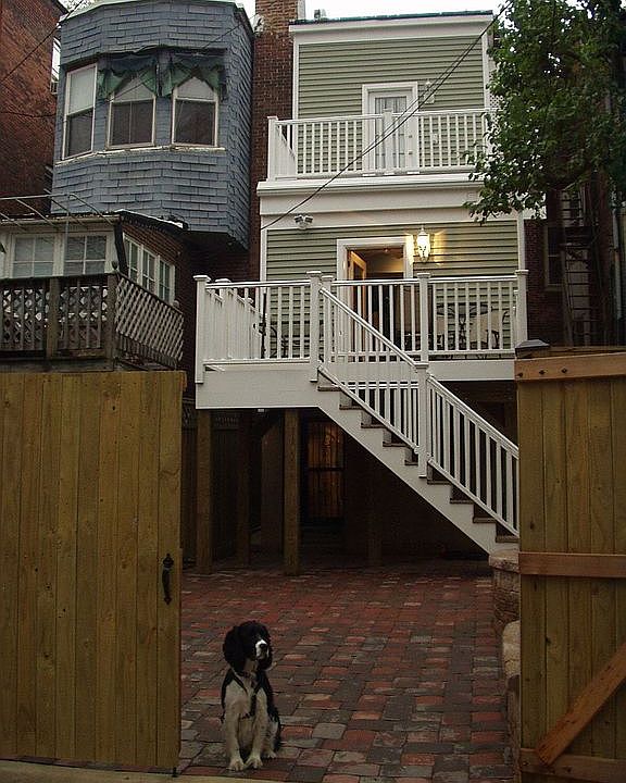 Fenced back yard w patio, deck and balconey