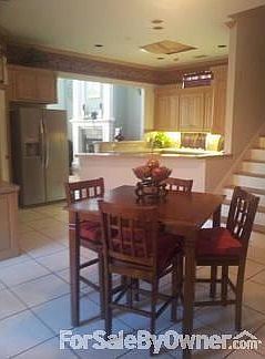 Entryway Breakfast Nook
						:
						Spacious area with large tile and over sized windows for patio view