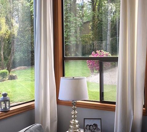 Looking thru your windows to the back yard. 

(Please note: back yard use is reserved for the main home but you're welcome to enjoy the view!)