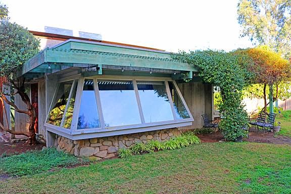 Slanted windows are only part of the uniqueness of Micheal Head, AIA designed solar house.