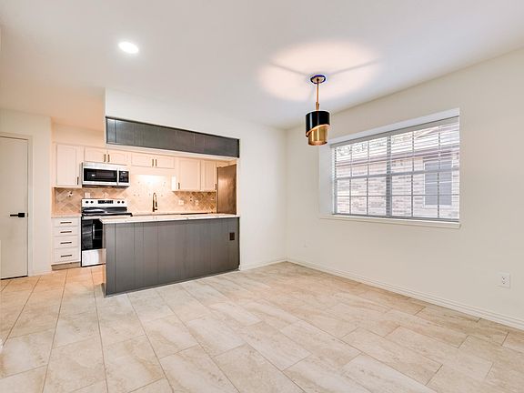 4th image of 4919 Woodland Park Blvd