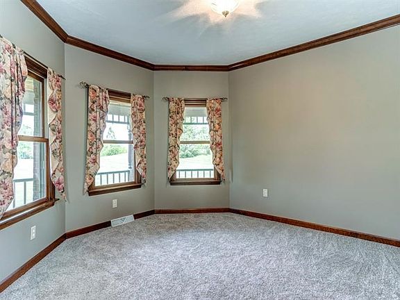 Formal living room with new carpet.