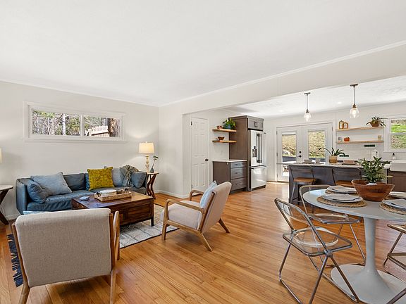 Open floor plan with tons of natural light and harwood floors throughout