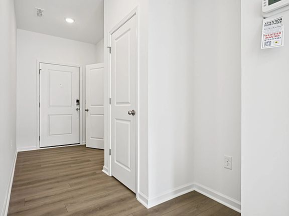 Foyer - An entry with sleek tones and flair.