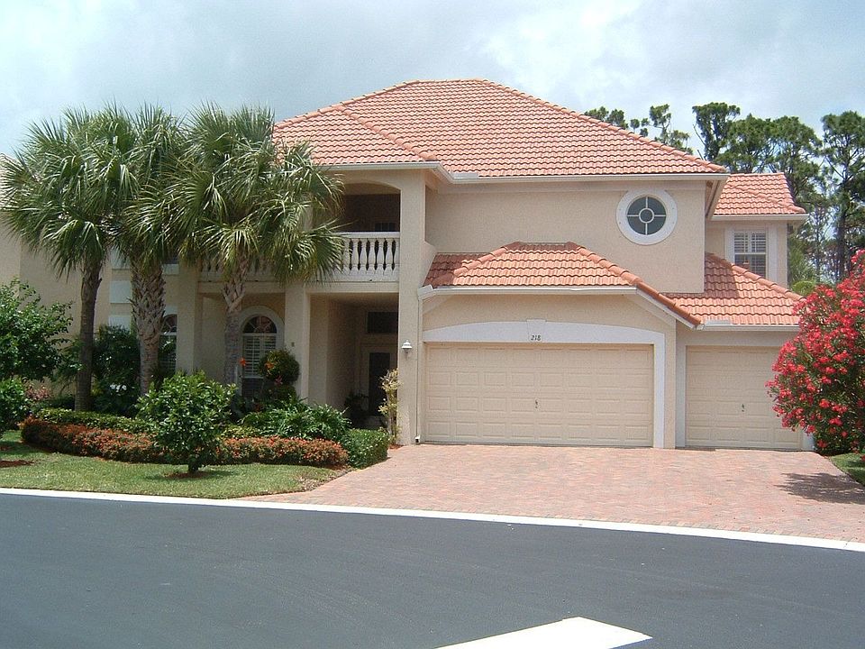 Contemporary design, 3 car garage and pavered drive.