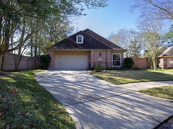 The front of the home is fully-bricked and offers a two car attached garage.