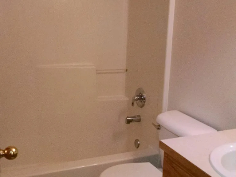 There are two full baths upstairs, both with tub/shower combinations.
