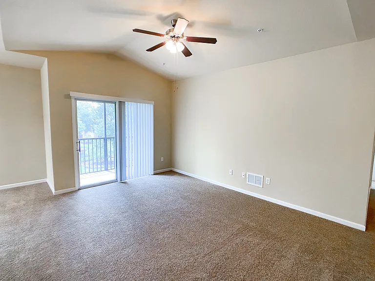 Open Concept Design with Lush Carpet in the Living and Dining Rooms Open Concept Design with Lush Carpet in the Living and Dining Rooms
