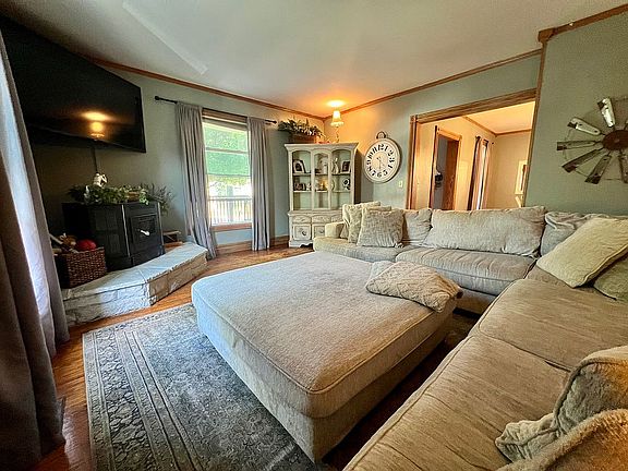 Living room with corn burner