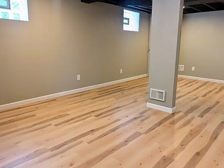 Glass block windows provide great light to the lower level.