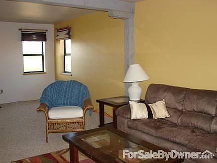 Living Room
						:
						Has a gas fireplace to the left out of the photograph.