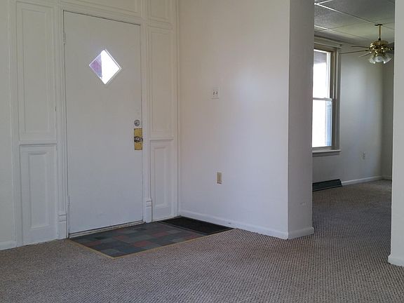 Living room looking into dining area