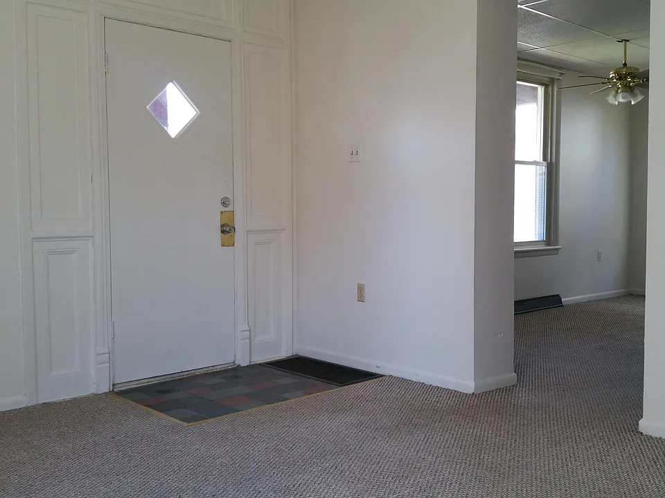 Living room looking into dining area
