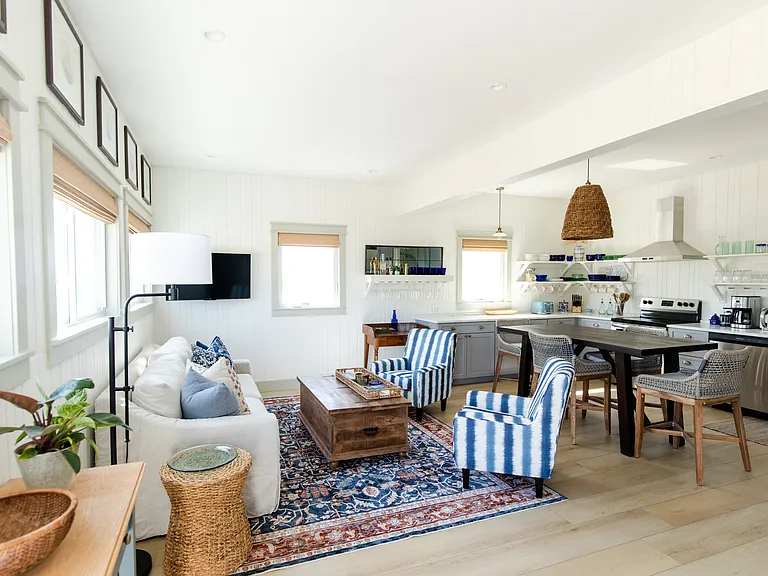The main level includes an open concept wit the living room and kitchen