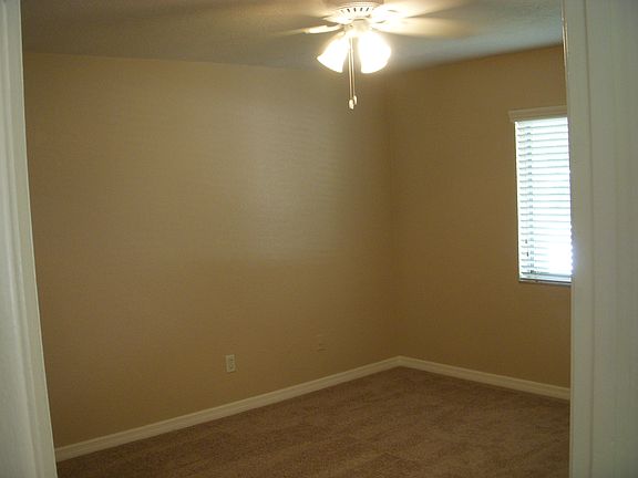 Master bedroom w/fan.