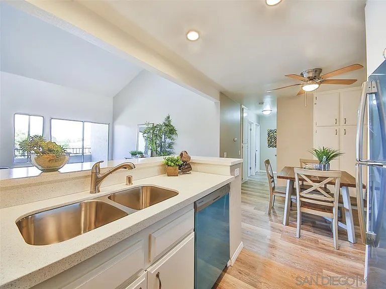 Older photo - lots of light in the unit and vaulted ceilings. The furniture pictured is different.