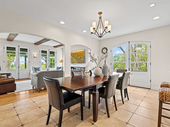 Dining room adjoins living and kitchen spaces