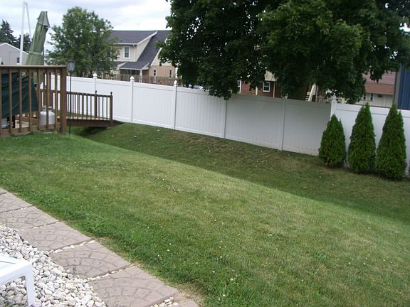 FENCE LINED YARD