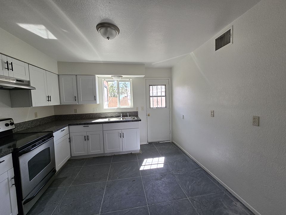 Large Kitchen with Door to Backyard