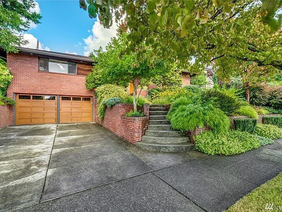 Welcome to 4544 Purdue Ave NW located in the heart of coveted Hawthorne Hill's Neighborhood.  Quiet tree lined street just steps away to the Burke Gilman Trail.  With its big double car attached garage and wide level driveway, there's plenty of off street parking for you and your guests.