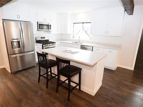 5th image of 6918 Maple Ave N