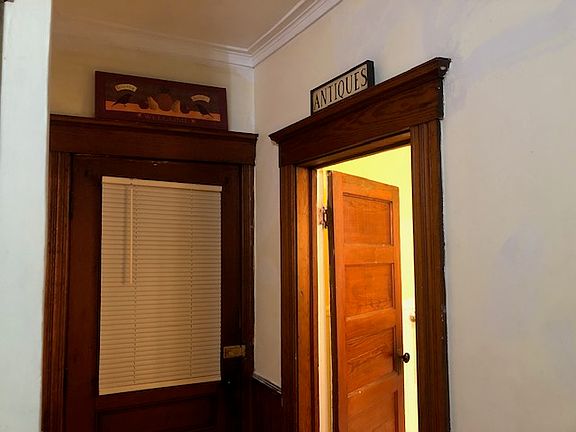 back door to mudroom/back entrance and bathroom entrance