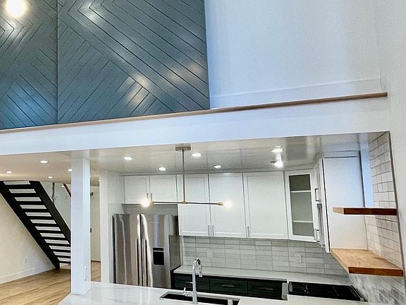 Tons of cabinetry with electrical outlets inside