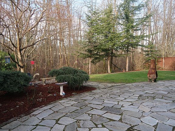 Beautiful backyard with rock stone patio and adjation to the