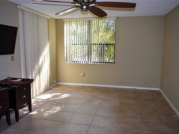 Master Bedroom w Sliders to the Balcony