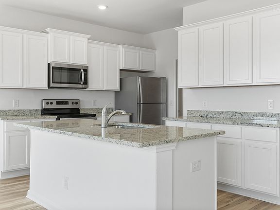 Enjoy cooking in a kitchen fill with counterspace