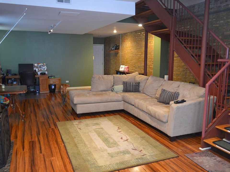 Huge living room with exposed brick