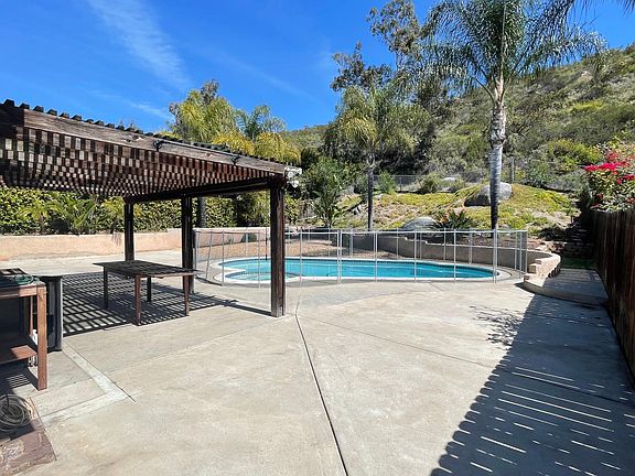 Private serene backyard with nothing but open space behind the house!