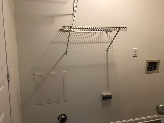 Laundry room with washer and dryer hookups