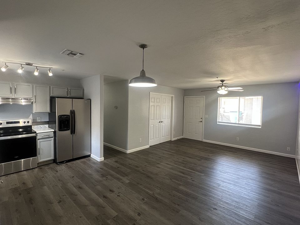 Main living space, bonus room and kitchen from backdoor.