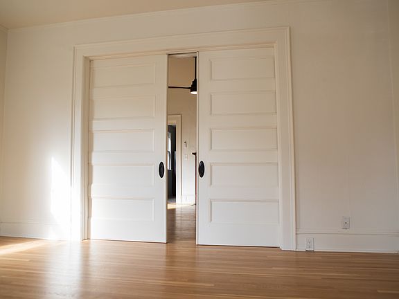 Double sliding doors between dining and living room