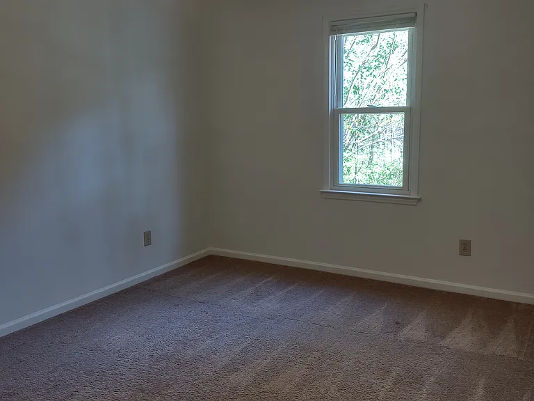 This photo has not been altered in any way: no edits or filters have been applied to try to deceive the viewer by having the room appear larger or brighter than it actually is.