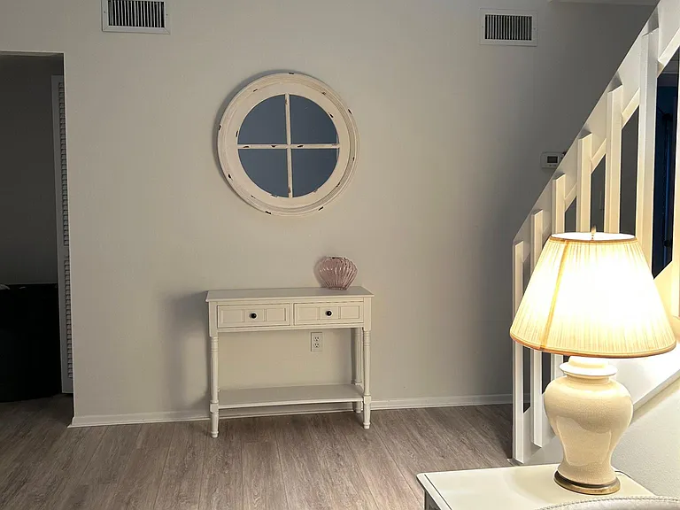 Foyer and half bath entrance with hall closet