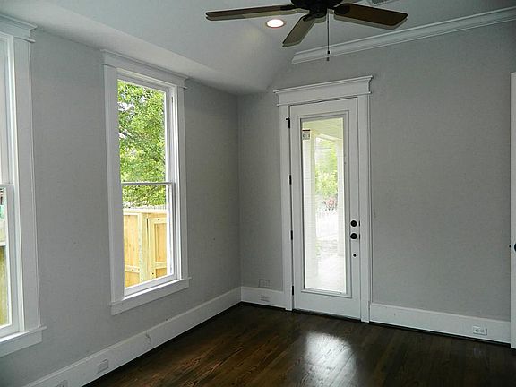 Downstairs guest bedroom opens to front porch. It has its own full bath. French door has built-in bl
