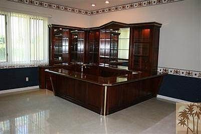 Wet Bar in spacious office room. Marble Floors beautiful wood.