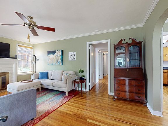 Living area with smart TV and plenty of seating,