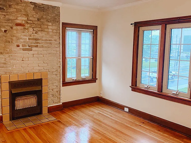 Living room with decorative fireplace