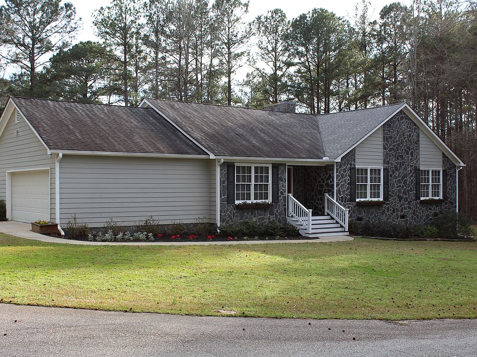 Stone and Wood Siding Ranch