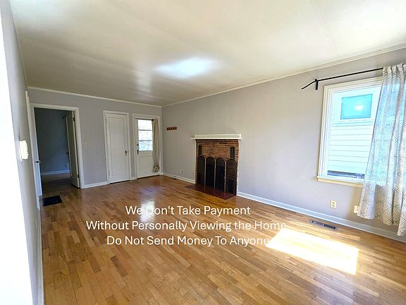 Large living room. Fireplace is inoperable.