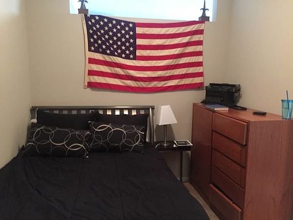 Bedroom, behind living room area